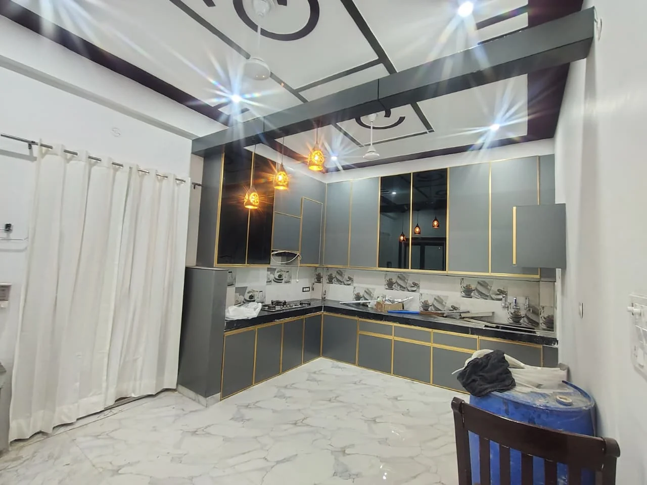 Showcase photo 4 for Acrylic & Marine Ply Modular Kitchen with SS Baskets